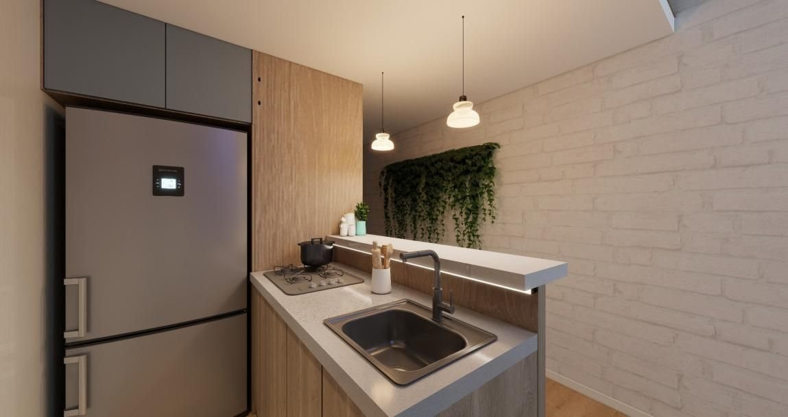 Cocina integral con nevera y mesón
